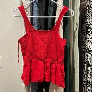 Red peplum tank